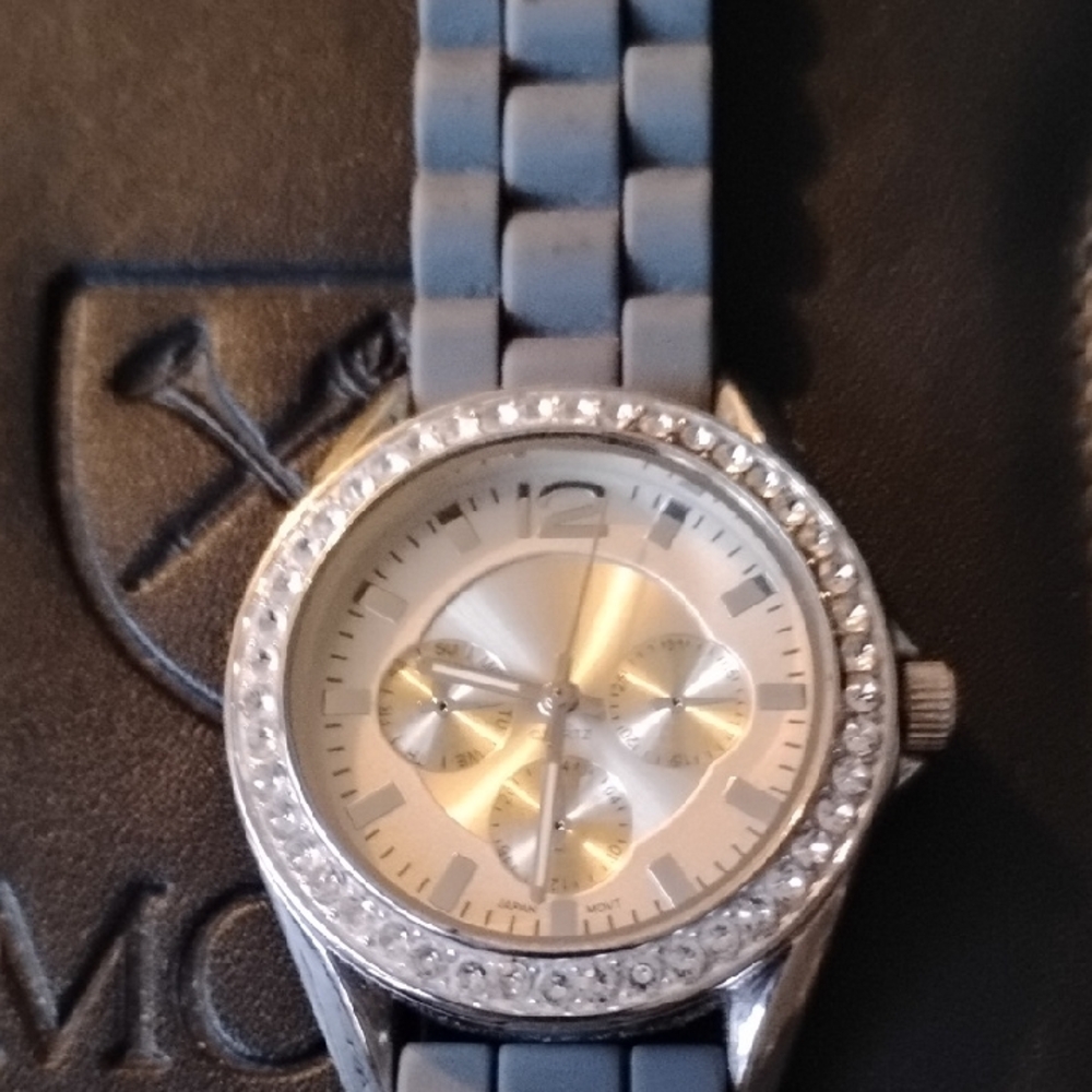 Silver Watch with Blue Strap and Crystal Details